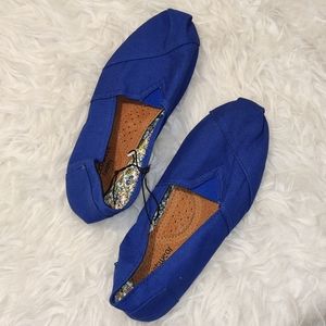 Blue canvas slip on shoes